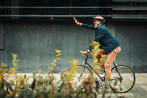 Exercises reduce stress - older man on a bicycle